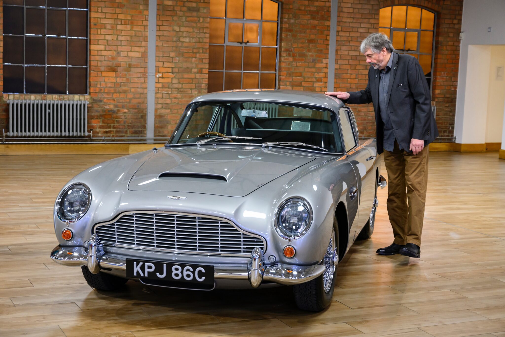 Mr-Willliams-with-his-restored-DB5-Vantage-scaled