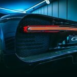 black car with red and white license plate