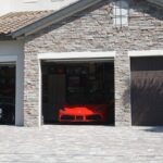a car is parked in the garage of a house