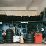 Texas Classic Car Shop Owner Hit With 60-Year Prison Sentence After $498,000 Engine Swap Scam a garage filled with lots of tires and tires