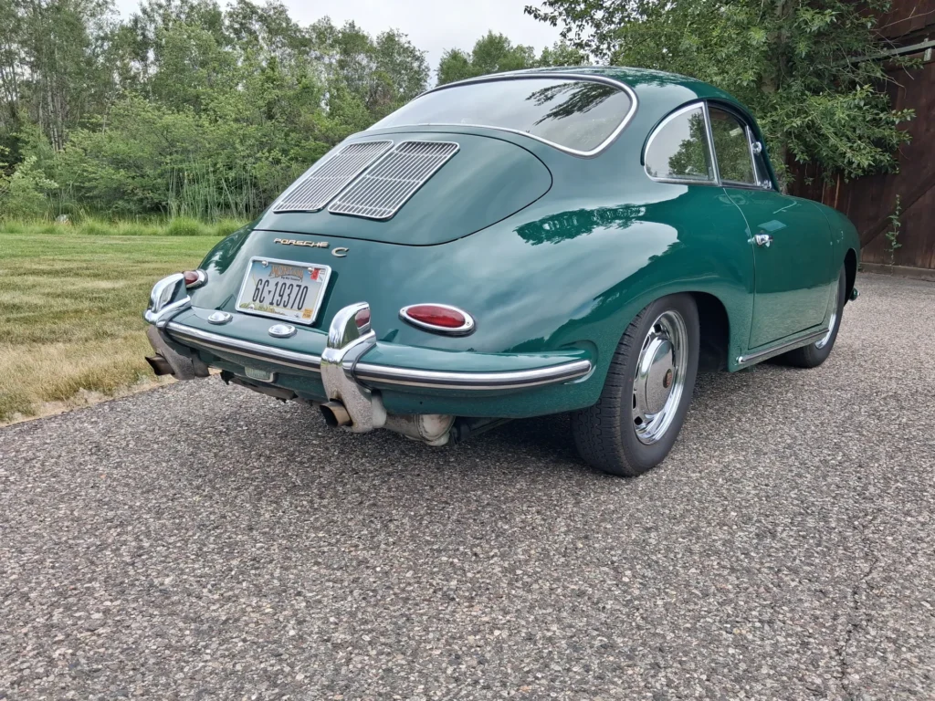 1965 Porsche 356C Coupe rear three-quarter view with Montana license plate and Porsche C badge