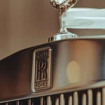 Stolen Rolls-Royce Case Update: What We Know Months After the Orland Park Arrest a close up of the hood ornament on a car