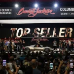 Barrett-Jackson top seller banner for the 2015 Porsche 918 Spyder at the Columbus, Ohio auction