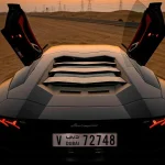 closeup photo of gray coupe on desert