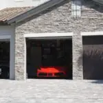 10 Garage Gadgets Every Car Collector Wishes They Bought Sooner a car is parked in the garage of a house