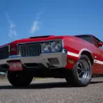 1970 Oldsmobile 442 W30 side profile, Matador Red with white stripes