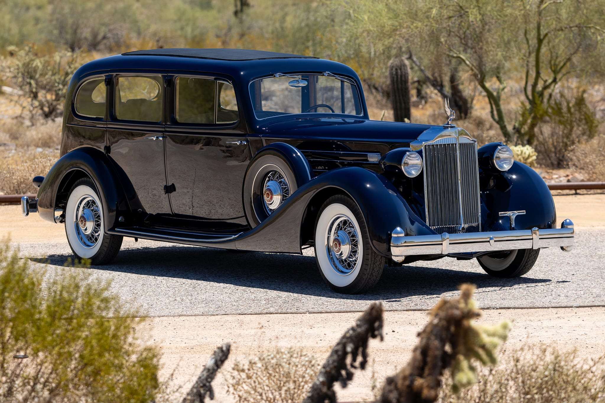 1935 Packard Twelve Series 1208 seven-passenger sedan side profile in dark blue