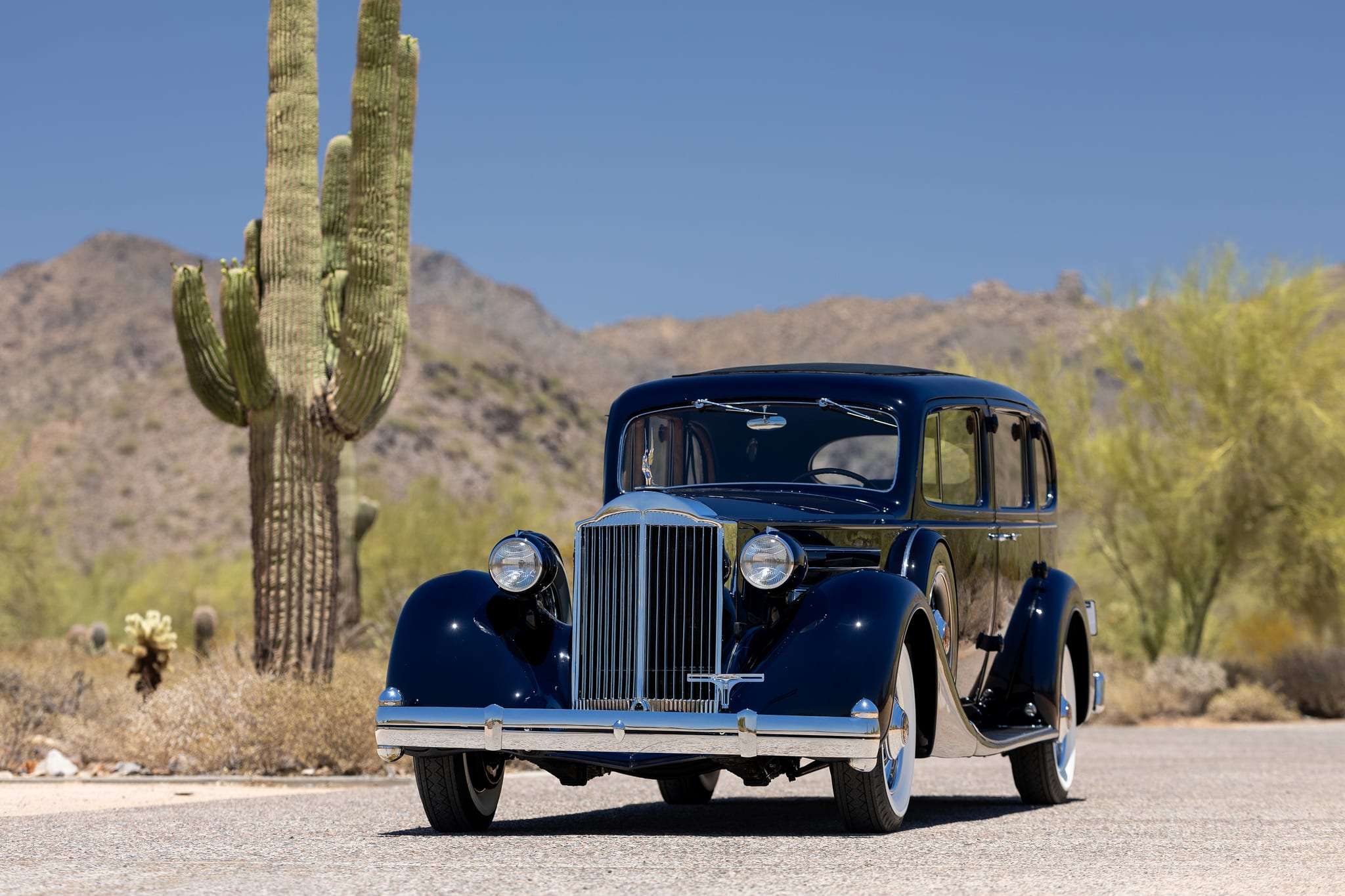 1935 Packard Twelve posed against a desert backdrop