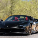 2023 Ferrari SF90 Spider finished in Nero Galaxy with Atelier tri-color livery, front three-quarter view