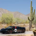 Rear three-quarter view of the Atelier Ferrari SF90 Spider showing the tri-color livery and matte bronze wheels