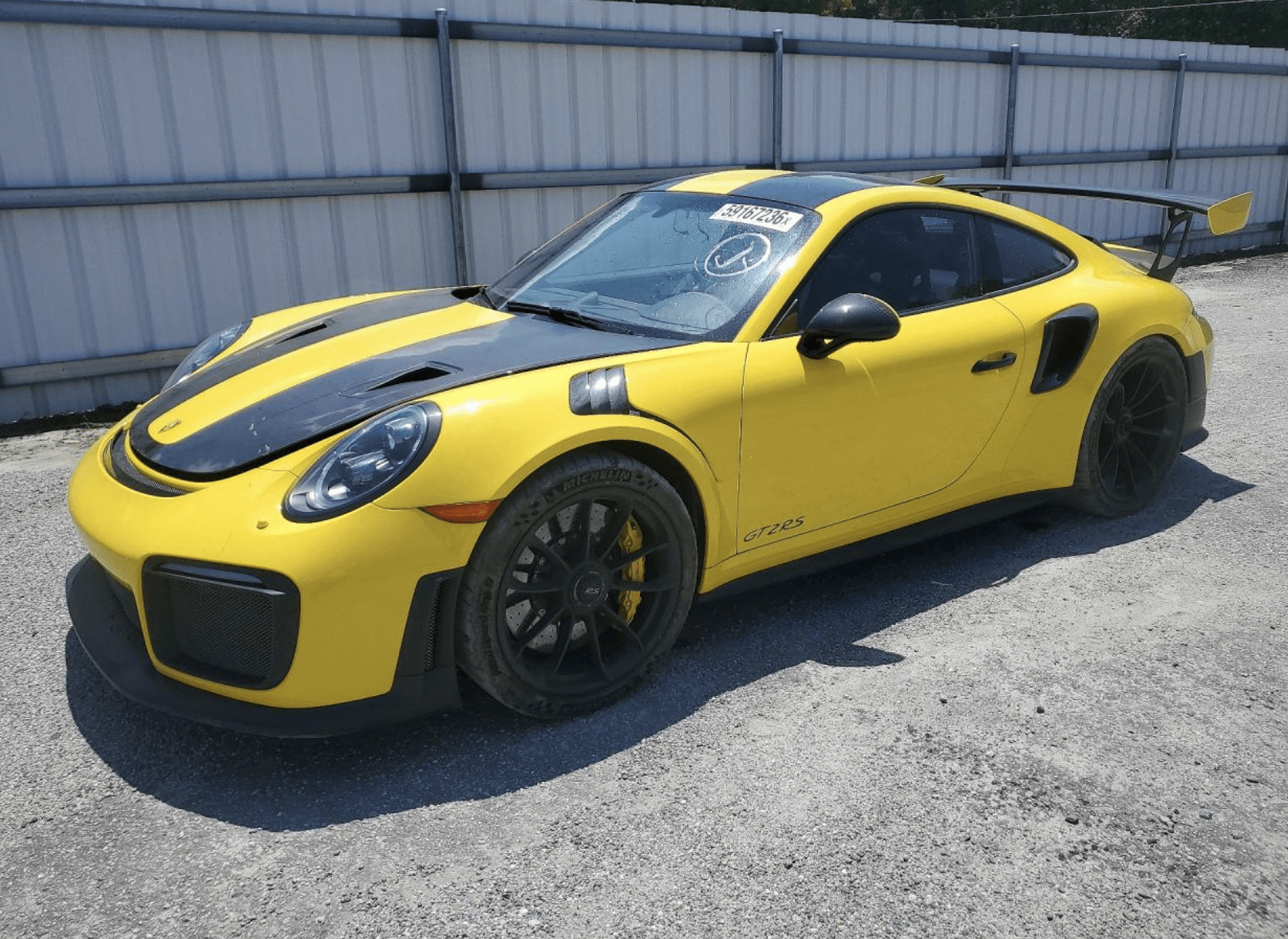 This 4,447-Mile Porsche 911 GT2 RS Weissach Just Landed on the Salvage Market - featured image