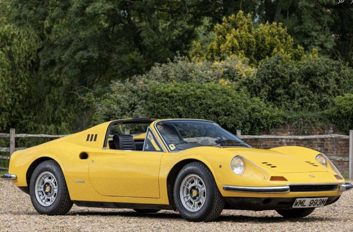 1973 Ferrari 'Dino' 246 GTS in yellow, front three-quarter view