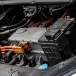 Electric car engine with visible wiring and battery components