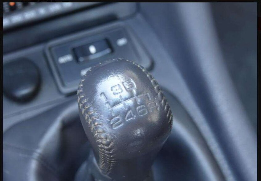 Six-speed Getrag manual shift knob in the 1995 Mitsubishi 3000GT VR-4, GAA Classic Cars