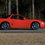 1995 Mitsubishi 3000GT VR-4 side profile showing active aero rear spoiler, offered by GAA Classic Cars