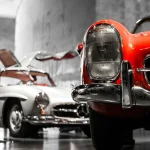 The 10 Most Expensive Cars Ever Sold At Auction two vintage cars beside gray concrete wall