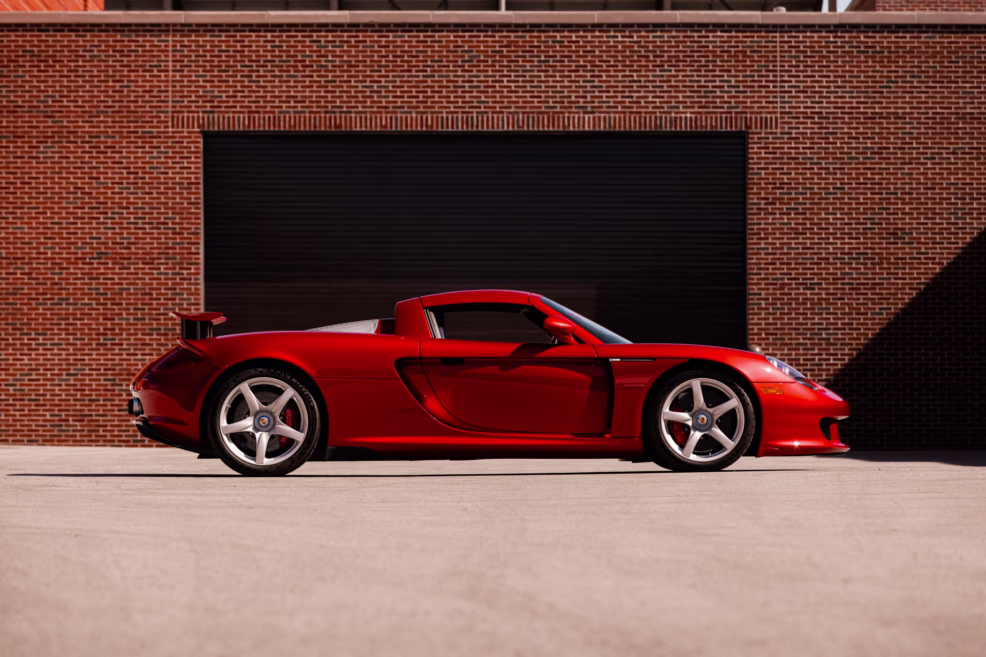 Three Icons for Sale on Mecum’s Monterey Auction: Porsche Carrera GT, McLaren P1 HDK & Mercedes-Benz 280 SE Cabriolet - featured image