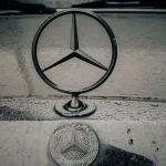 Mercedes-Benz Will Now Document How Your Classic Left the Factory. It Won't Tell You What It Became. a mercedes emblem on the front of a car