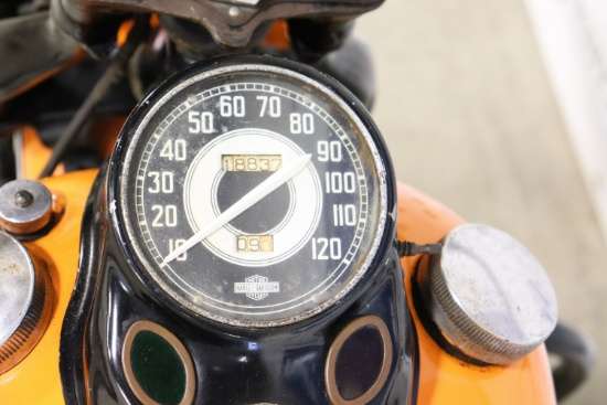 Speedometer of the 1941 Harley-Davidson UL reading 18,837 miles