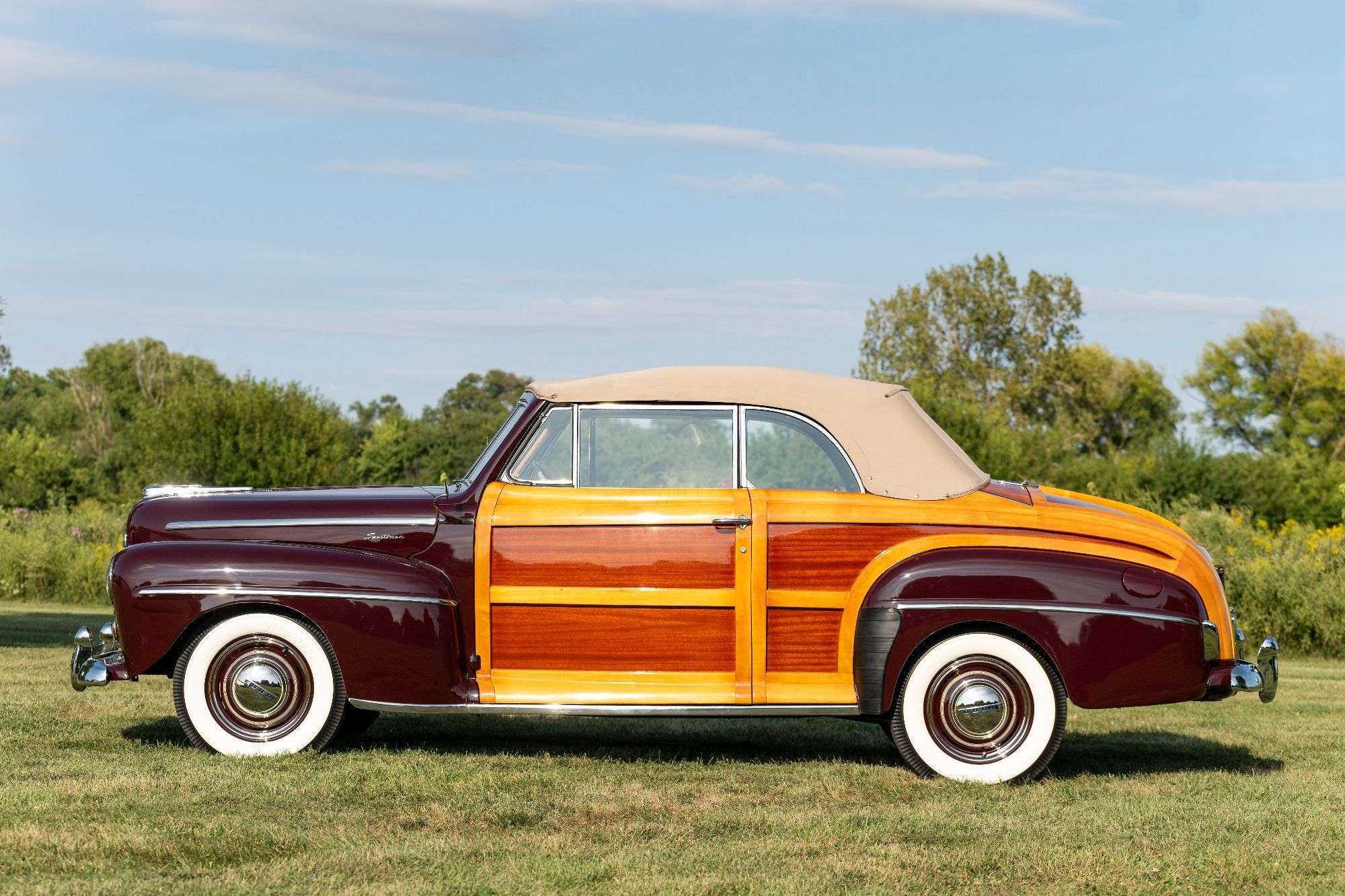 Side profile of the 1947 Ford Sportsman convertible with tan canvas top