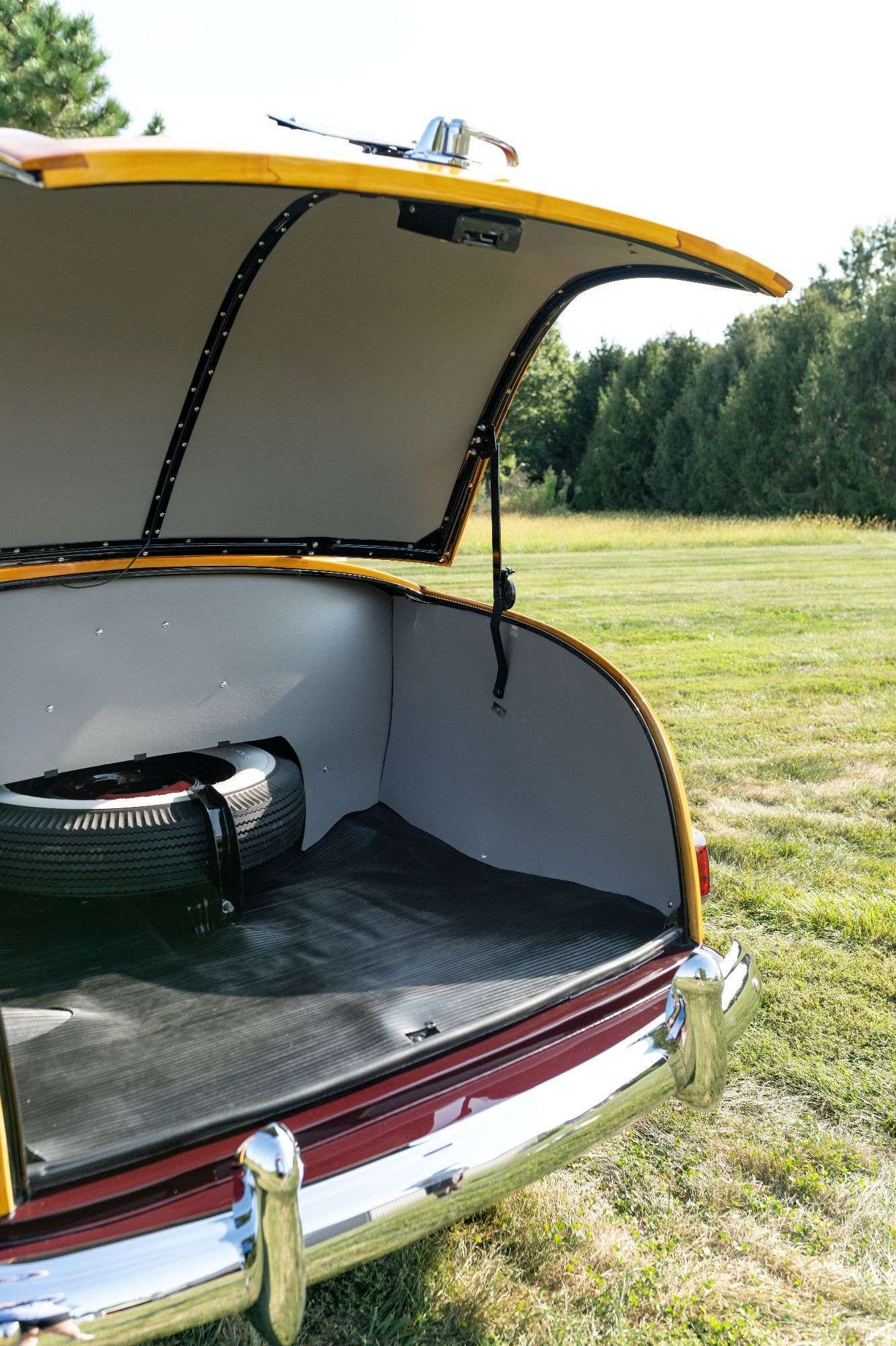 Open trunk with spare tire on the 1947 Ford Sportsman