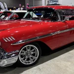 1958 Chevrolet Impala Hardtop For Sale at Vicari Auction Biloxi Fall 2026 Front three-quarter view of the red 1958 Chevrolet Impala hardtop for sale at Vicari Auction Biloxi Fall 2026