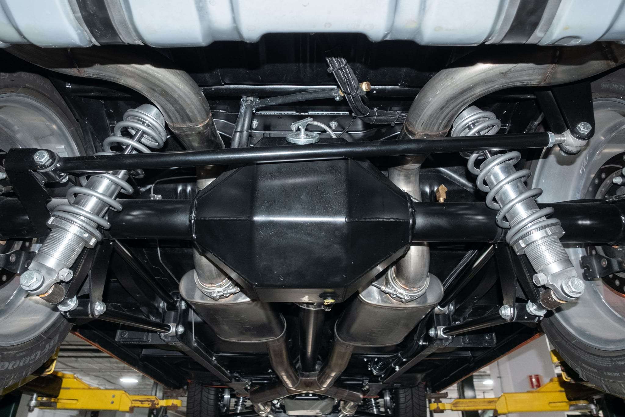 Heidts subframe and four-link suspension detail under a 1963 Chevy II Nova SS restomod