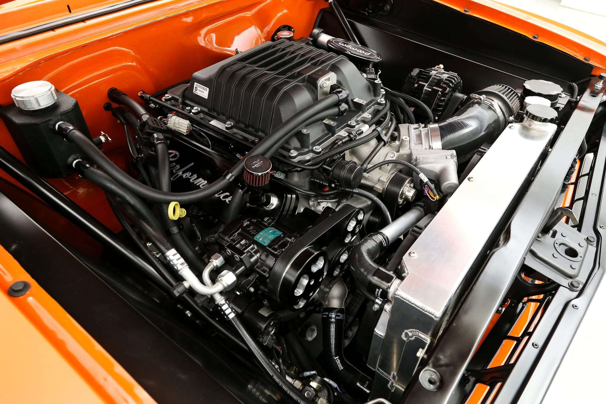 Black leather TMI bucket seats and Dakota Digital instrumentation inside a 1963 Chevy II Nova SS restomod