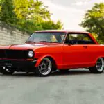 Sebring Orange Metallic 1963 Chevrolet Chevy II Nova SS restomod front three-quarter view