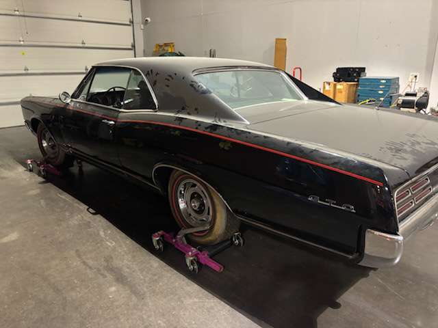 1967 Pontiac GTO in storage, where it spent the last 35 years as a museum car