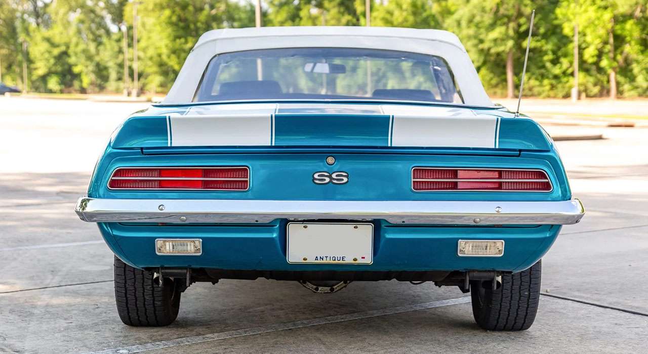 1969 Camaro convertible rear view with white soft top raised