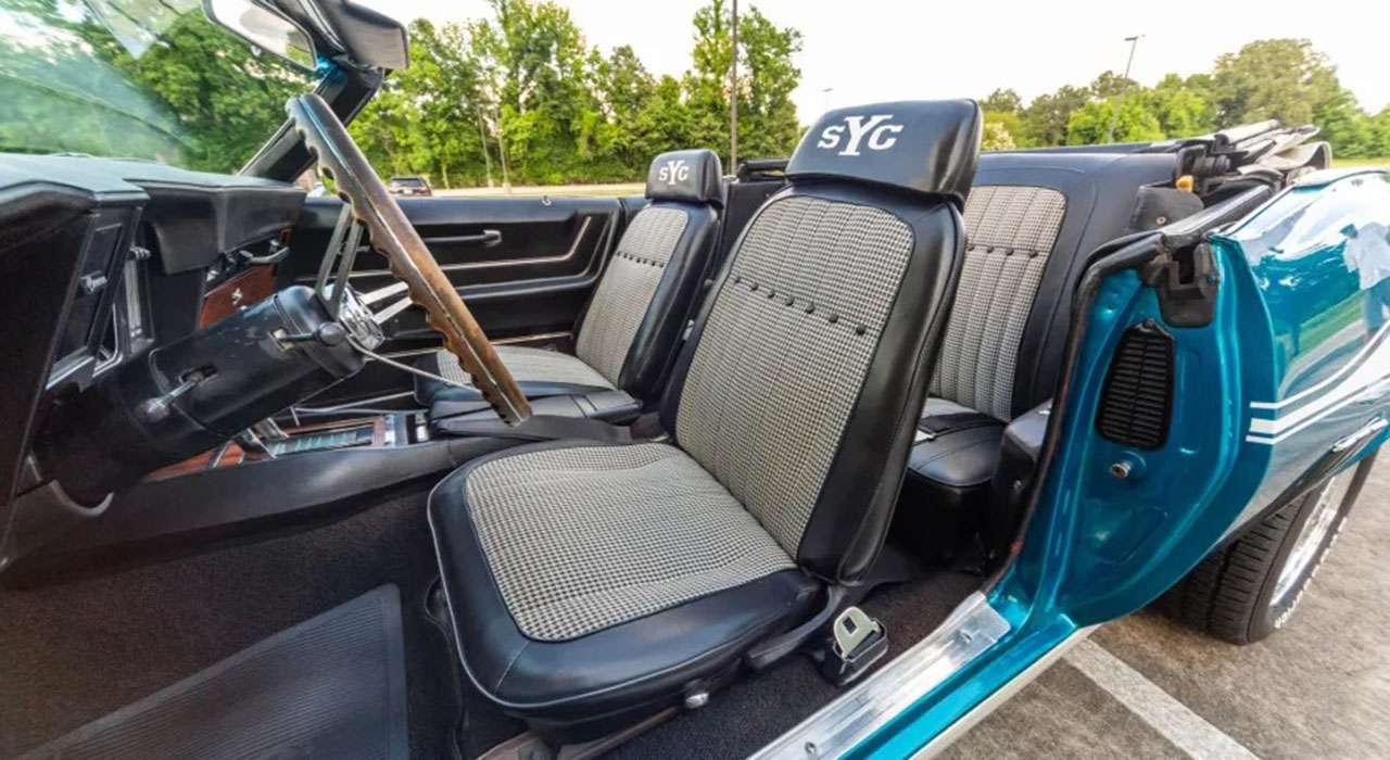Black and white houndstooth bucket seats with Yenko SC-style headrest decals