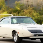 Alpine White 1970 Plymouth Superbird front three-quarter view with nose cone and rear wing