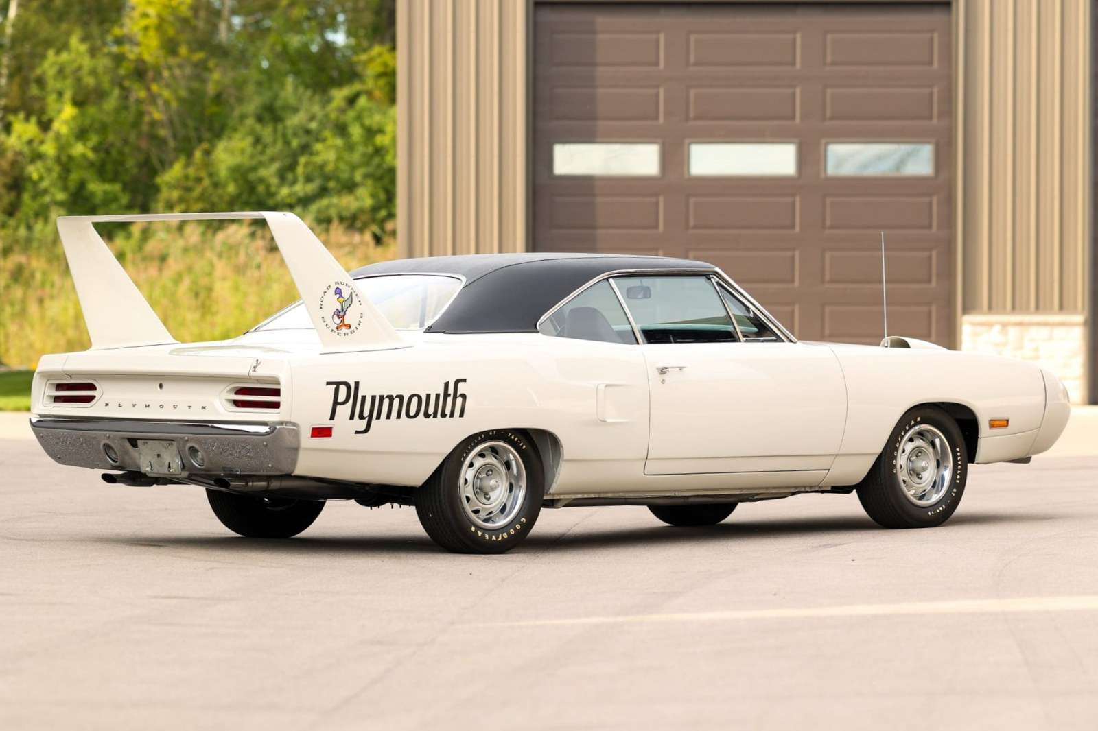 Rear three-quarter view of the Alpine White 1970 Plymouth Superbird showing its stabilizer wing