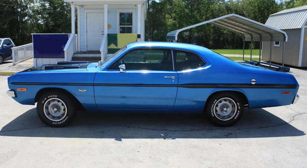 Side profile of the blue 1972 Dodge Dart Demon tribute coupe