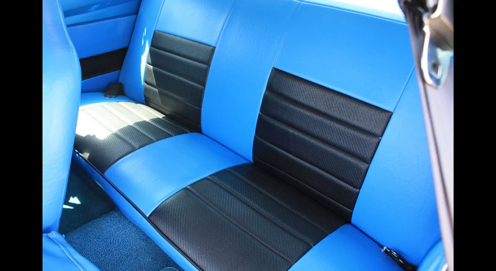 Reupholstered blue and black seats in the 1972 Dodge Dart Demon tribute