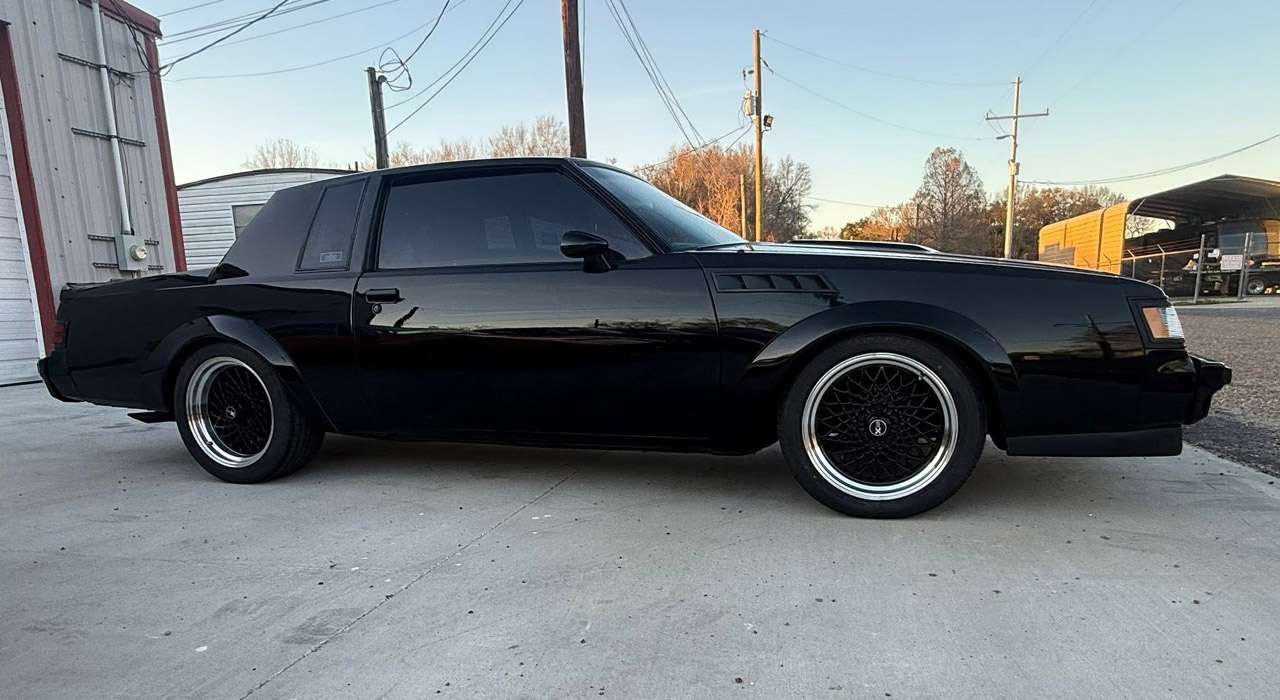 Driver-side profile of black 1987 Buick GNX No. 461