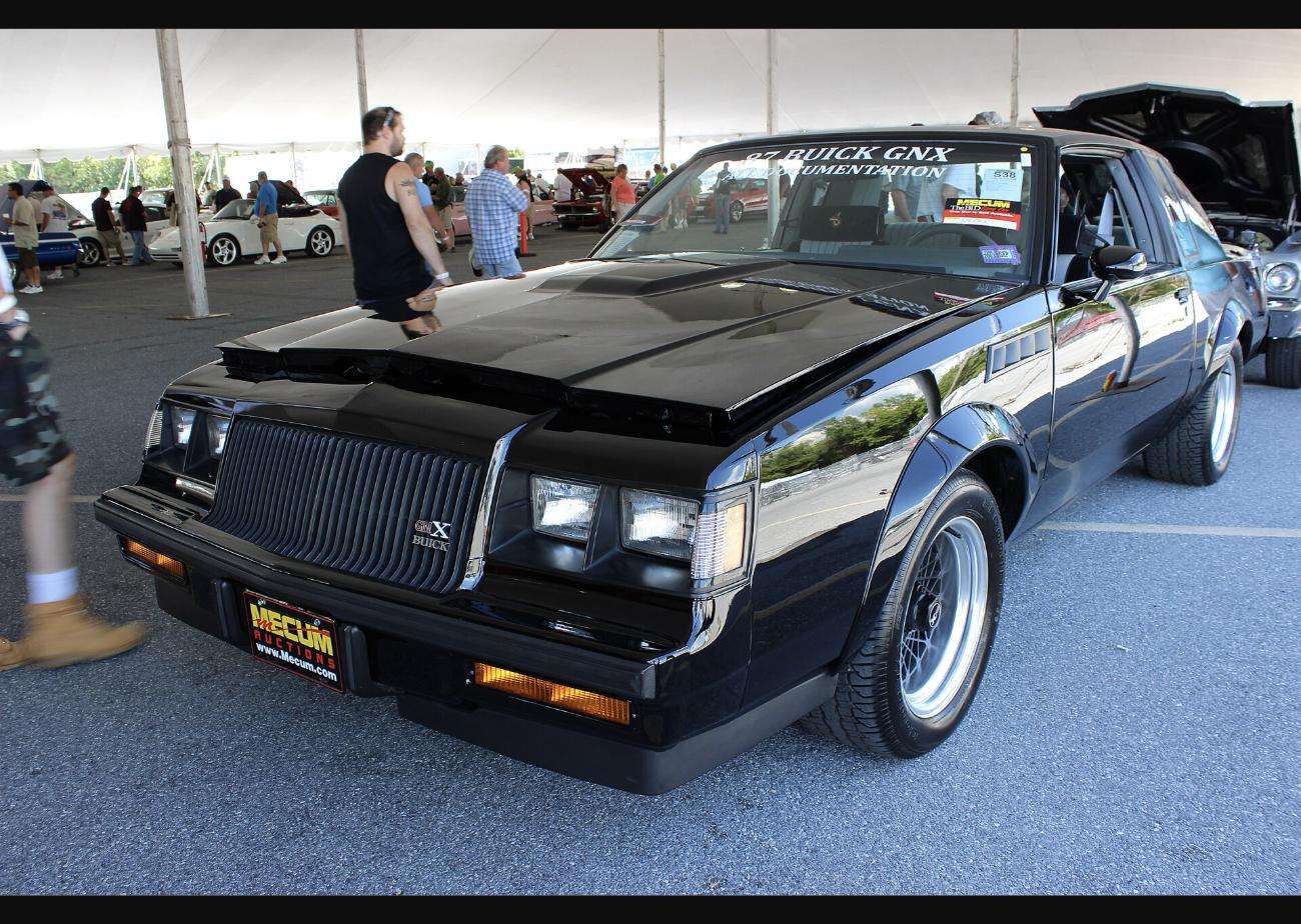 1987 Buick GNX front three-quarter view showing the GNX grille badge, quad headlights and flared front fenders