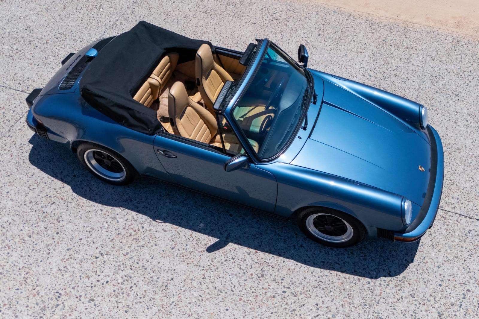 Overhead view of the Cashmere Beige leather interior of the 1989 Porsche 911 Carrera Cabriolet
