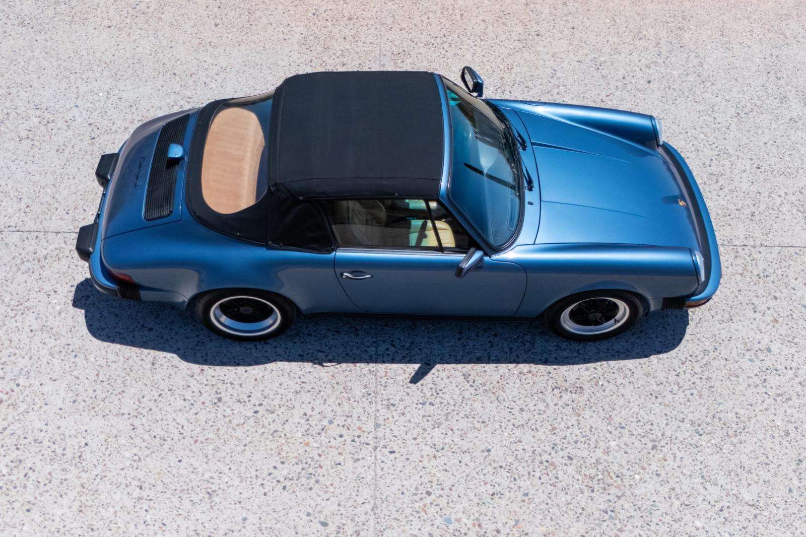 1989 Porsche 911 Carrera Cabriolet with black soft top raised