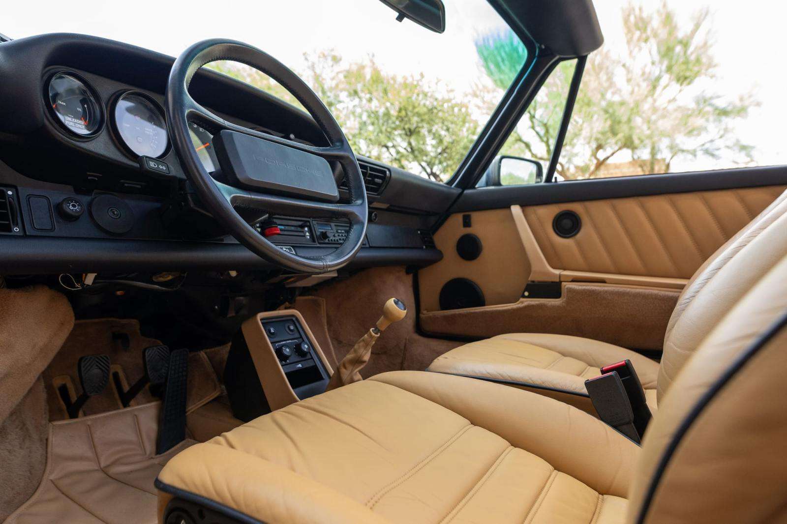 Cashmere Beige leather cabin and steering wheel of the 1989 Porsche 911 Carrera