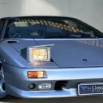 1998 Lamborghini Diablo VT Roadster with its pop-up headlights raised and targa panel removed, offered at Lloyds Auctions