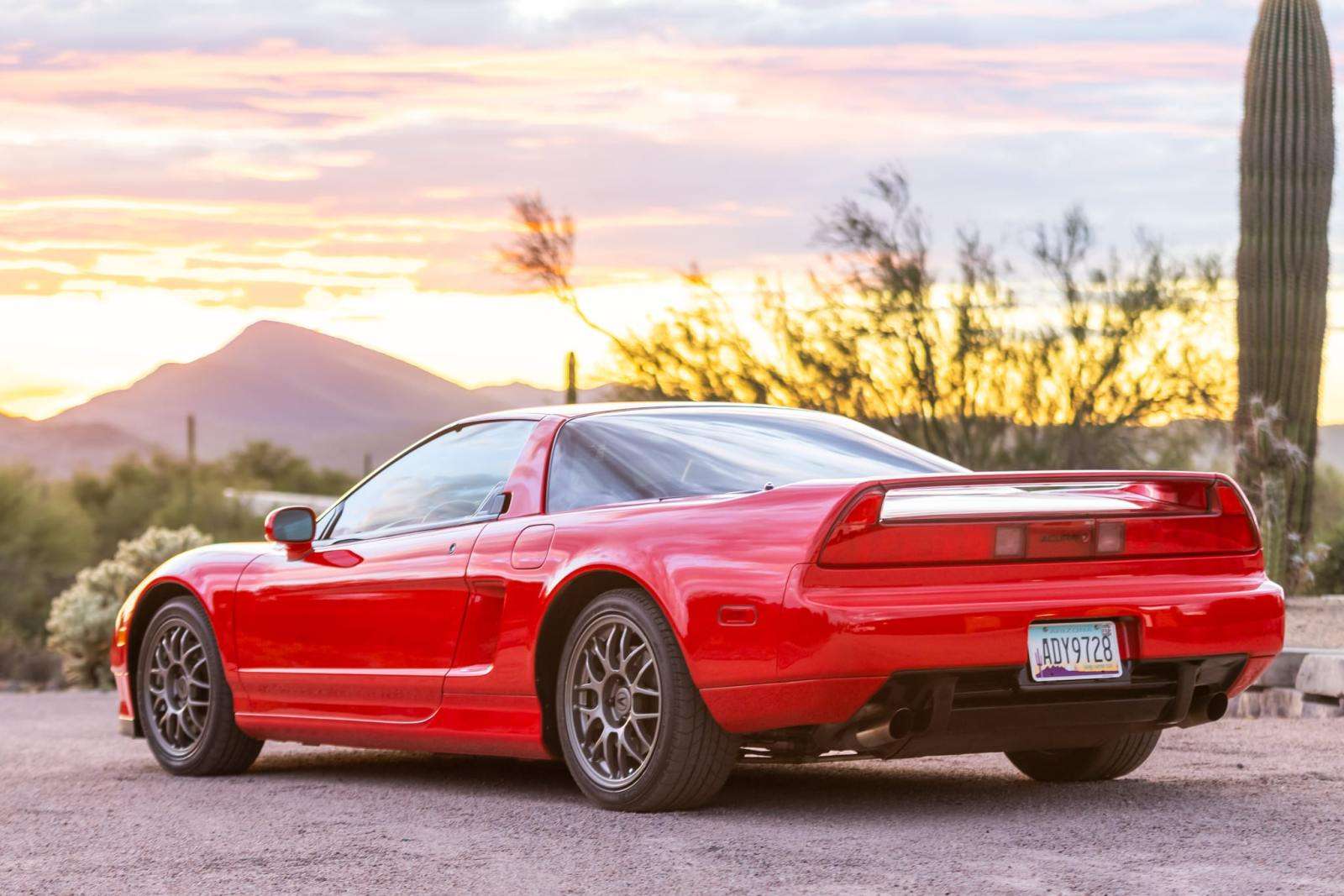 Rear three-quarter view of 1999 Acura NSX Zanardi Edition at sunset