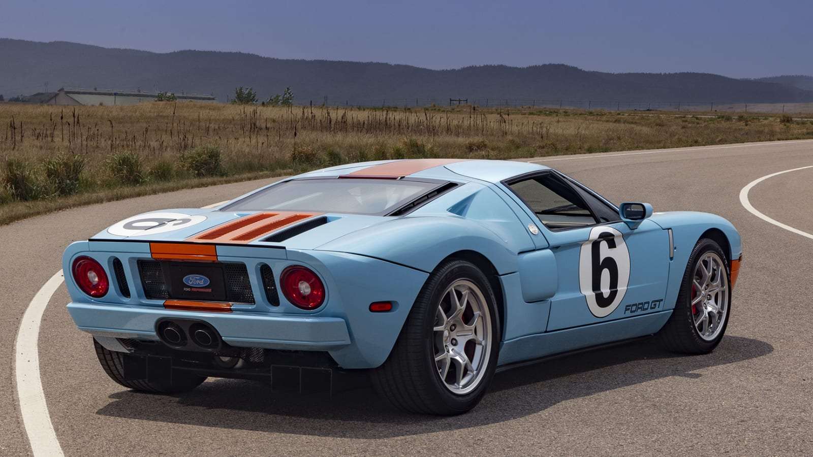 Rear three-quarter view of the Ford GT Heritage Edition showing BBS wheels and red calipers