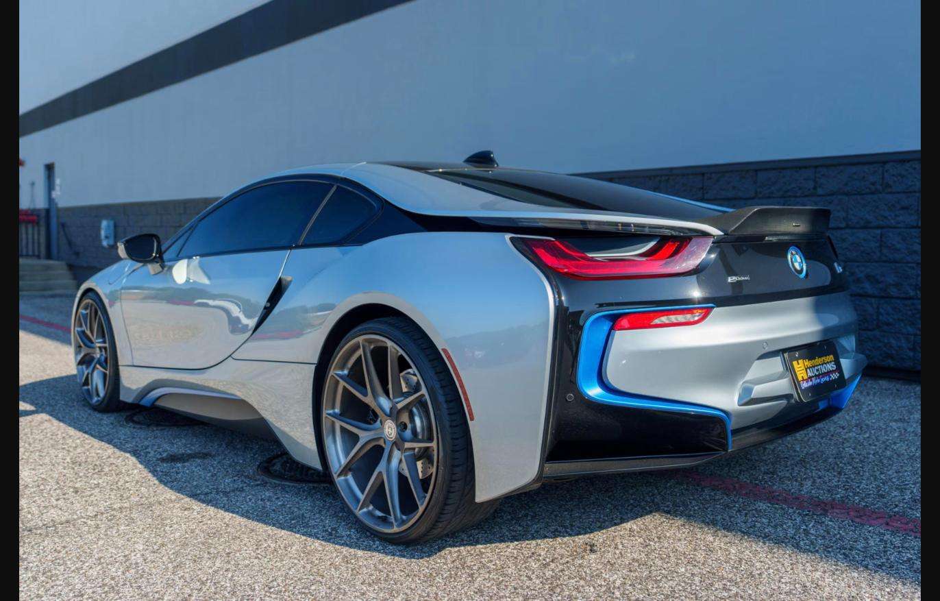 Low rear three-quarter view of the 2015 BMW i8 selling at Henderson Auctions