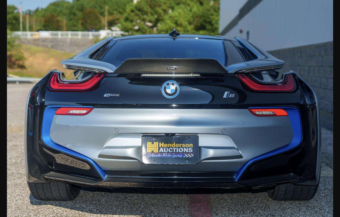 Rear view of the 2015 BMW i8 with Henderson Auctions Collector Motor Series plate