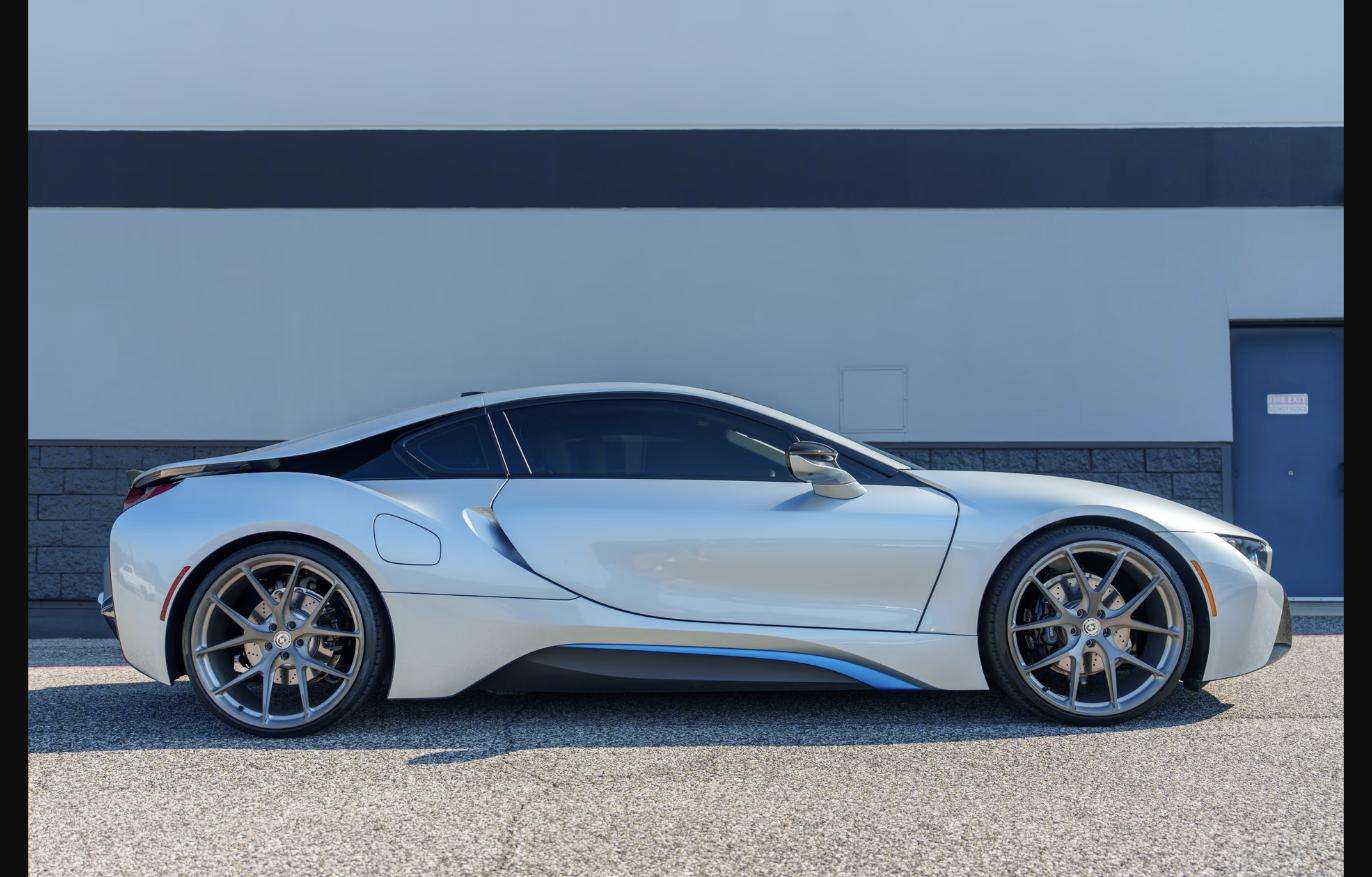Side profile of the 2015 BMW i8 on custom 22-inch HRE wheels