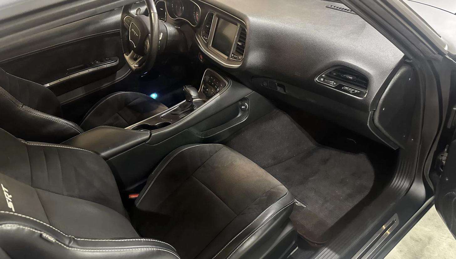 Factory 2016 Dodge SRT Hellcat interior retained inside the 1969 Charger restomod