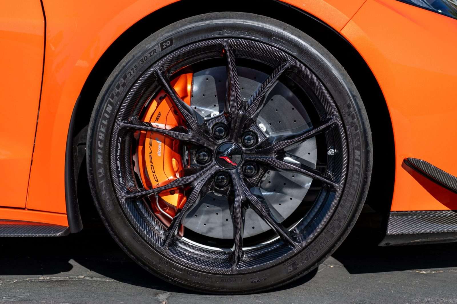 Carbon-fiber wheel with orange Alcon brake caliper on the 2027 Corvette ZR1X