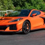 The $402,000 Corvette ZR1X Isn't a Collector-Car Price. It's the Cost of Not Waiting. Sebring Orange 2027 Chevrolet Corvette ZR1X coupe, front three-quarter view